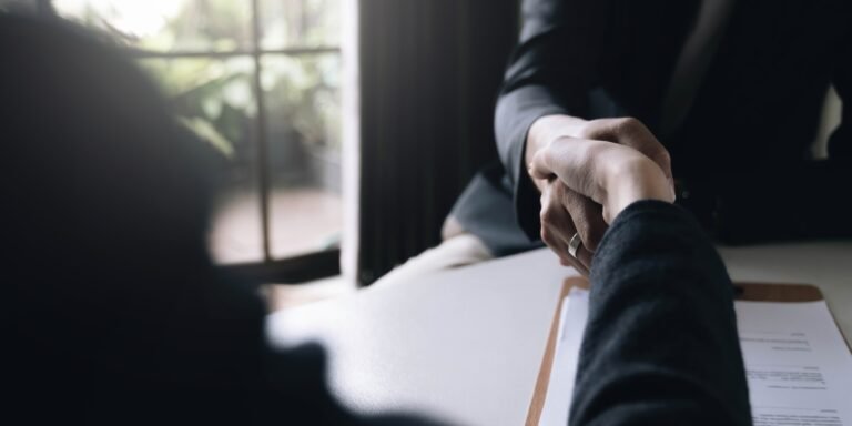 Lawyer business women shaking hands with clients, after finishing up a Consulting for insurance rent